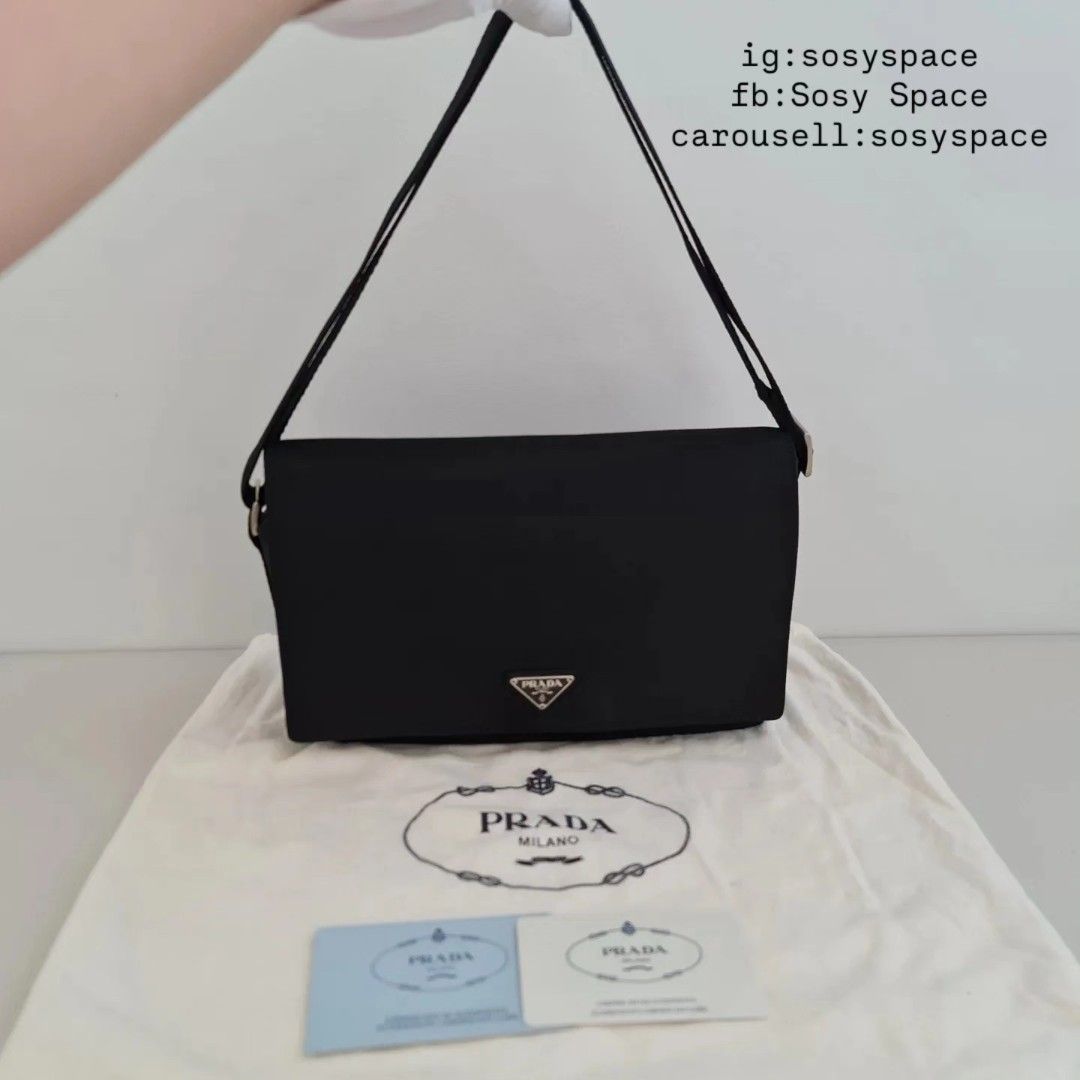 Prada Black Nylon Tessuto Shoulder Bag Sling bag (Category: Luxury Bags & Wallets) located in Lucena. Submitted by sosyspace (Listing ID 1447772977, Image 1). Description: P. R. A. D. A. 28B1P71 Black Nylon Tessuto Shoulder/Sling Bag Adjustable Strap 18 to 40 cm Magnetized Flap Closure 24x8x16.5 cm Includes: authenticity card and dustbag Condition: PRE-OWNED Like new to me Price: Php 21,000 + HF + SF (Best Price Already. No More Haggling Please!�