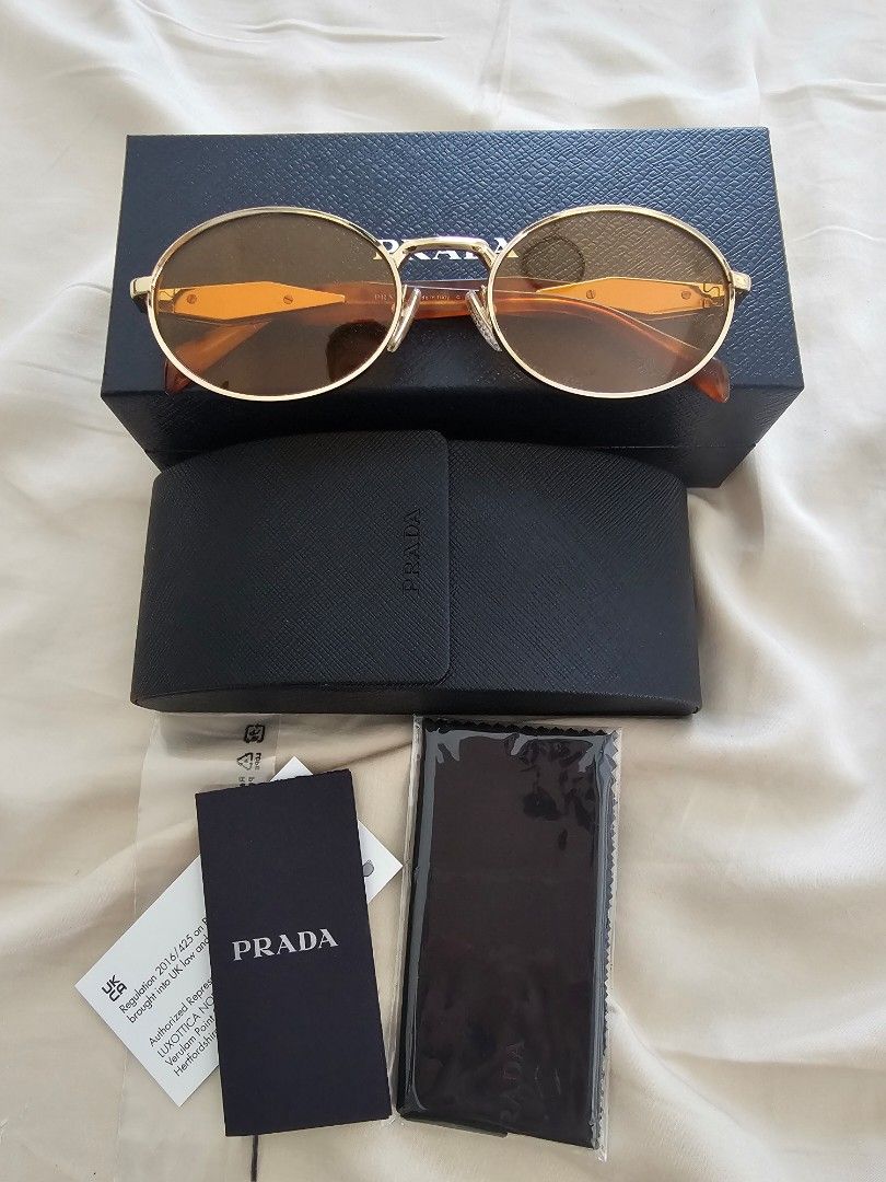Prada gold orange PR65zS 7312 (Category: Sunglasses & Eyewear) located in Taguig. Submitted by riello (Listing ID 1447730752, Image 1). Description: can pass as new slightly negotiable. bought in Paris in Aug 2024. used only maybe 5 to 10x. decluttering .