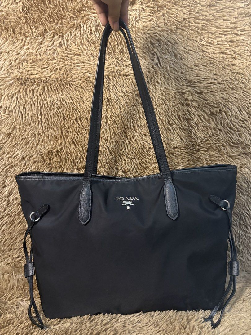 Prada tote Bag (Category: Luxury Bags & Wallets) located in Bacolod City. Submitted by SweetieThings_0929 (Listing ID 1447680195, Image 1). Description: Authentic Prada One zipper pocket Silver hardware’s.