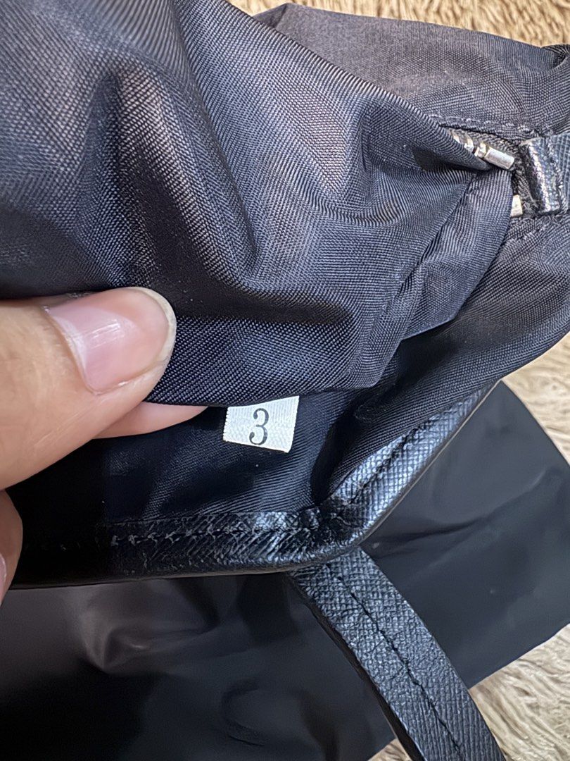 Prada tote Bag (Category: Luxury Bags & Wallets) located in Bacolod City. Submitted by SweetieThings_0929 (Listing ID 1447680195, Image 3). Description: Authentic Prada One zipper pocket Silver hardware’s.