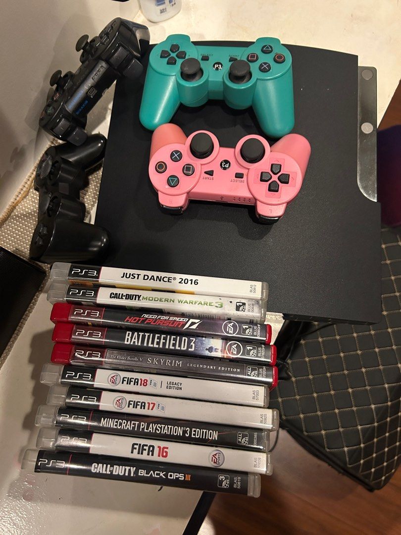 PS3 Console Bundle: 4Controllers & 9 Games (Category: PlayStation) located in Manila. Submitted by coolbanana852 (Listing ID 1447866737, Image 1). Description: - PlayStation 3 slim Console - 24Controllers (Pink & Teal) - 9 Games Included: - Just Dance 2016 - Call of Duty: Modern Warfare 3 - Need for Speed: Hot Pursuit - Battlefield 3 - The Elder Scrolls V: Skyrim Legendary Edition - FIFA 18 - FIFA 17 - Minecraft PS3 Edition - FIFA 16 - Call of Du