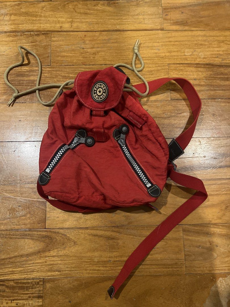 Red Kipling Backpack with Drawstring Closure (Category: Backpacks) located in Quezon City. Submitted by maitemouse (Listing ID 1447814074, Image 1). Description: - Cute red Kipling backpack - Drawstring closure - Two zippered front pockets - Adjustable straps - Perfect for everyday use or travel.