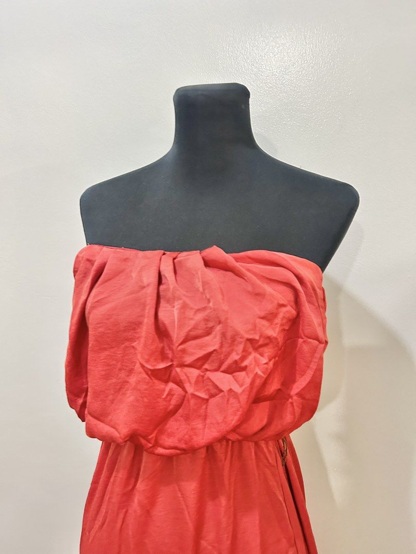 Red Maxi Dress Tube (Category: Dresses) located in Manila. Submitted by yuShin09 (Listing ID 1447842886, Image 2). Description: - Strapless maxi dress by City Triangles - Vibrant red color - Flattering ruched bust detail - Comfortable elasticated waist - Flowy, long skirt - Ideal for casual wear or beach vacations - Effortless to style and wear.