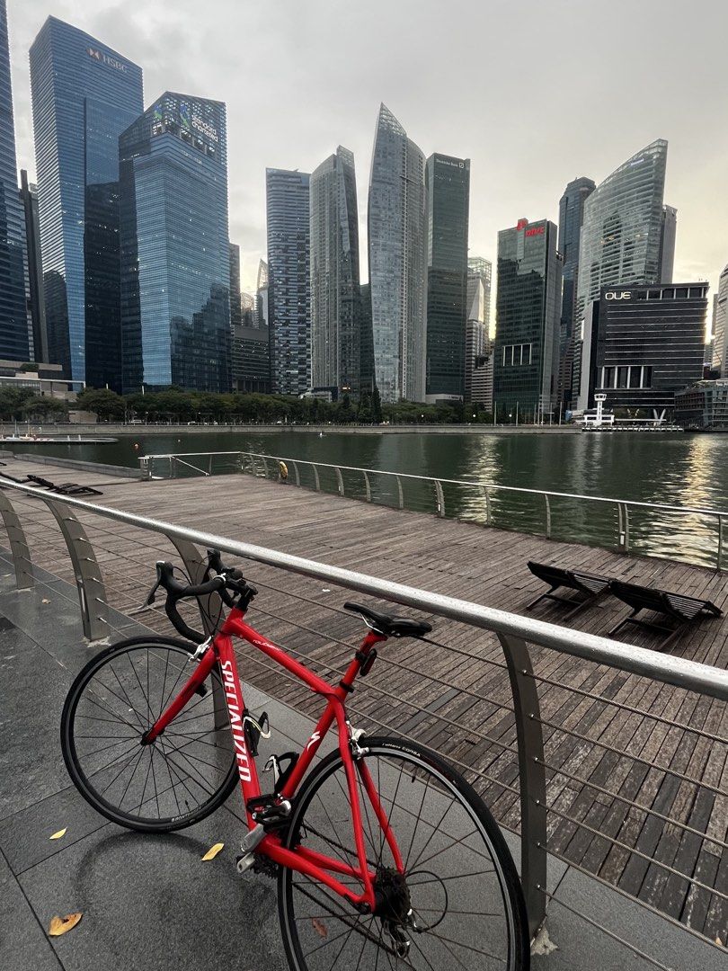 Red Specialized Roubaix Road Bike with Accessories (Category: Bicycles) located in Singapore. Submitted by arghyasad93489 (Listing ID 1447720909, Image 1). Description: Selling my Specialized Roubaix road bike as I’m relocating to Germany. I bought the bike second-hand about 2 years ago, had it serviced after purchase, and have only ridden it a handful of times since. It has been kept indoors and remains in good mechanical condition, riding and s