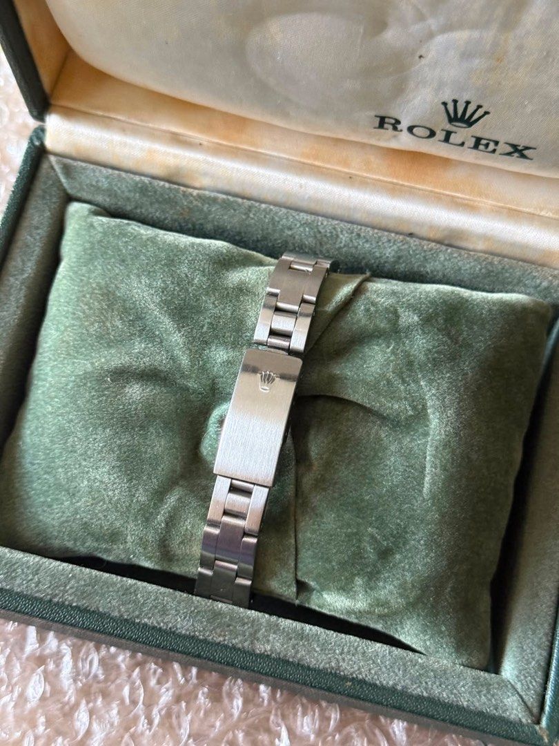 Rolex Oyster Perpetual Watch with Box (Category: Luxury Watches) located in Las Pinas. Submitted by katieryn (Listing ID 1447814404, Image 2). Description: Authentic Rolex Oyster Perpetual Rare Sigma Dial (18k solid gold dial) Ref No: 6718/6723 Cal. 2030 Automatic/ Manual wind Case size: 25mm All original Rolex double box inclusion Extra one link - Ideal for watch collectors.
