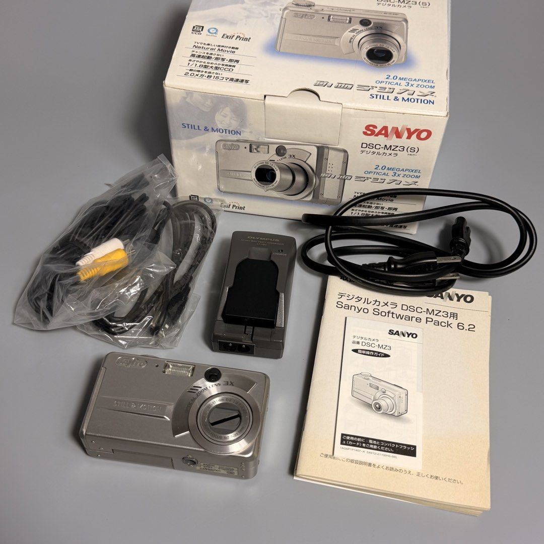 Sanyo MZ3 - Retro Digital Camera (Category: Cameras) located in Cavite. Submitted by datsoretro (Listing ID 1447863509, Image 2). Description: Fully functional vintage camera from Sanyo. The lenses dont close fully when turned off but it does not affect operation. Everything in the photo (original accessories) are included. PLEASE NOTE: This camera uses a Compact Flash Storage that is not included in the package price. Pick up at my location to c