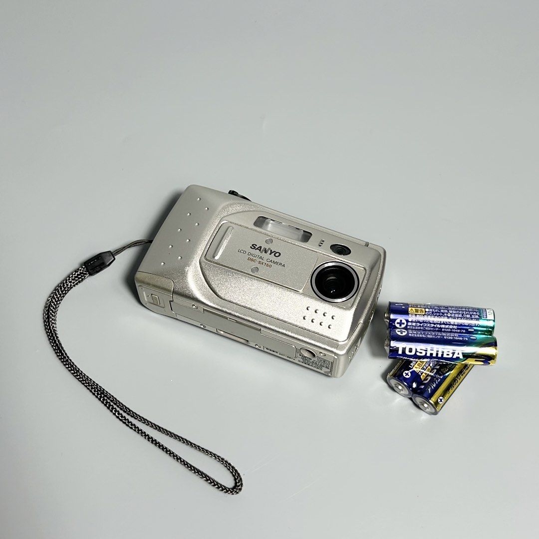 Sanyo SX150 - Vintage Digital Camera (Category: Cameras) located in Cavite. Submitted by datsoretro (Listing ID 1447863918, Image 2). Description: Fully functional camera with no operational problems and only minimal scratches. Everything in the photo is included. Conveniently uses AA batteries (Toshiba will be provided) and very portable. PLEASE NOTE: Camera uses a Compact Flash storage that is not included in the packaged price. Pickup via loca