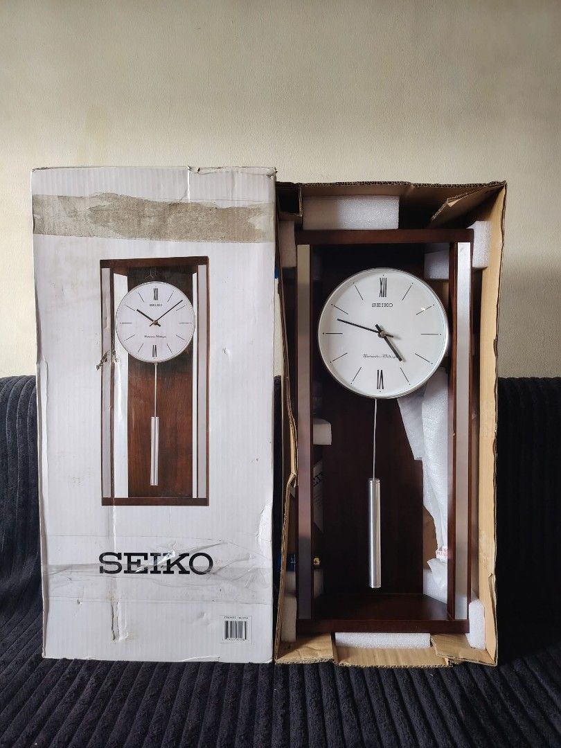 Seiko Wooden Pendulum Wall Clock (Category: Clocks) located in Quezon City. Submitted by JennaMarieD (Listing ID 1447879152, Image 2). Description: - Classic Seiko pendulum wall clock - Elegant wooden design - Clean white face for easy readability - Functional pendulum for accurate timekeeping - Comes in its original box - Perfect addition to any room in your home - Feel free to ask any questions!.