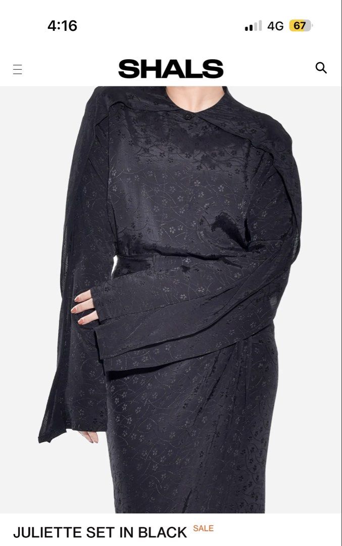 SHALS Juliette Top in Black XS (Category: Baju Kurung & sets) located in Petaling Jaya. Submitted by annewahida (Listing ID 1447758833, Image 1). Description: Worn twice Only the top SHALS Black Juliette - Features a textured floral pattern - Long sleeves with a unique draped effect .