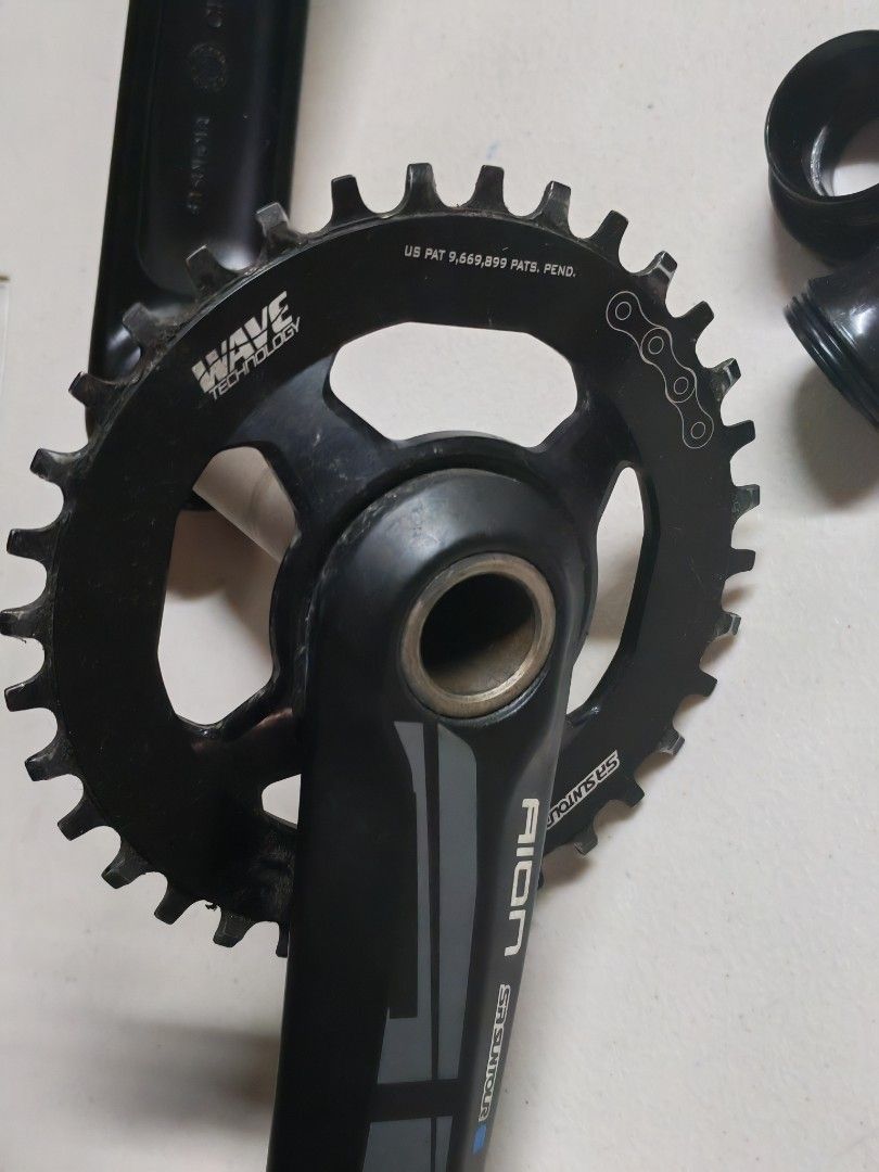 Shimano AION Crankset with Wave Technology Chainring (Category: Bicycles) located in Manila. Submitted by GentleGiant (Listing ID 1447716974, Image 2). Description: - Shimano AION Crankset - Ideal for Mountain Bikes - Features innovative Wave Technology on chainring - Comes with bottom bracket parts and spacers - Sleek black color - Feel free to ask any questions!.