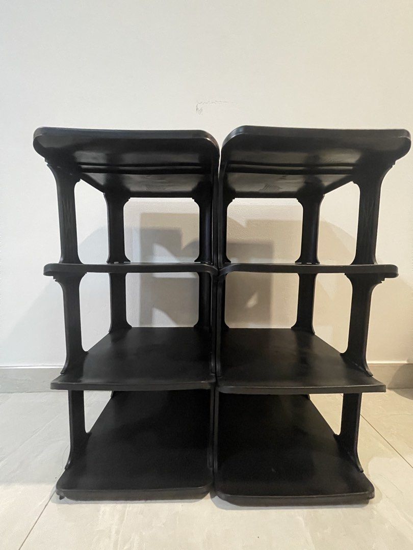 Shoe rack - stackable (Category: Shelves, Cabinets & Racks) located in Singapore. Submitted by k9823 (Listing ID 1447814525, Image 2). Description: - Set of 2 black 3-tier shelving units - Modular: can be stacked or used side-by-side - Ideal for organizing shoes, books, and more - Made of sturdy plastic - Easy to assemble and disassemble - Pickup only.