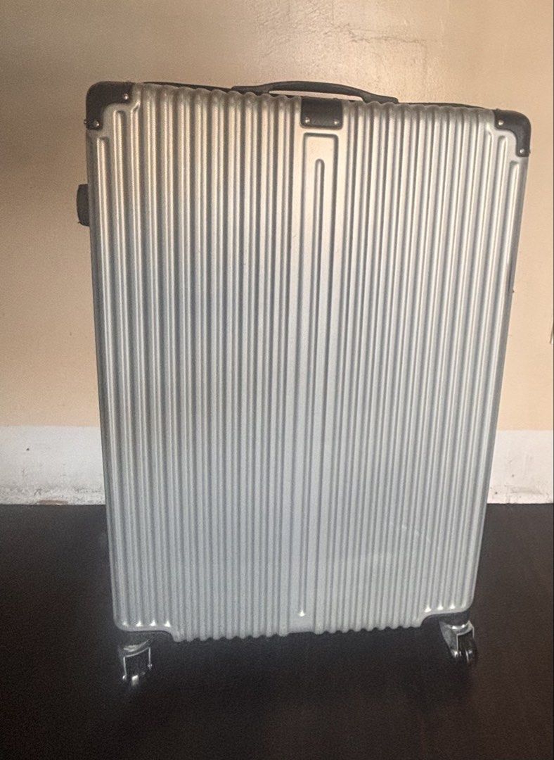 Silver Large Travel Luggage Trolley (Category: Luggage) located in Manila. Submitted by hotstuffmanila (Listing ID 1447862911, Image 1). Description: Silver Travel Luggage Trolley Large Luggage for Sale: This is the large-sized luggage from a 3-piece luggage set (small medium and large). Price: For the large luggage only. I’m also selling it together with the medium luggage for ₱3,000. The small luggage (cabin size) has a broken handle, but I’ll 