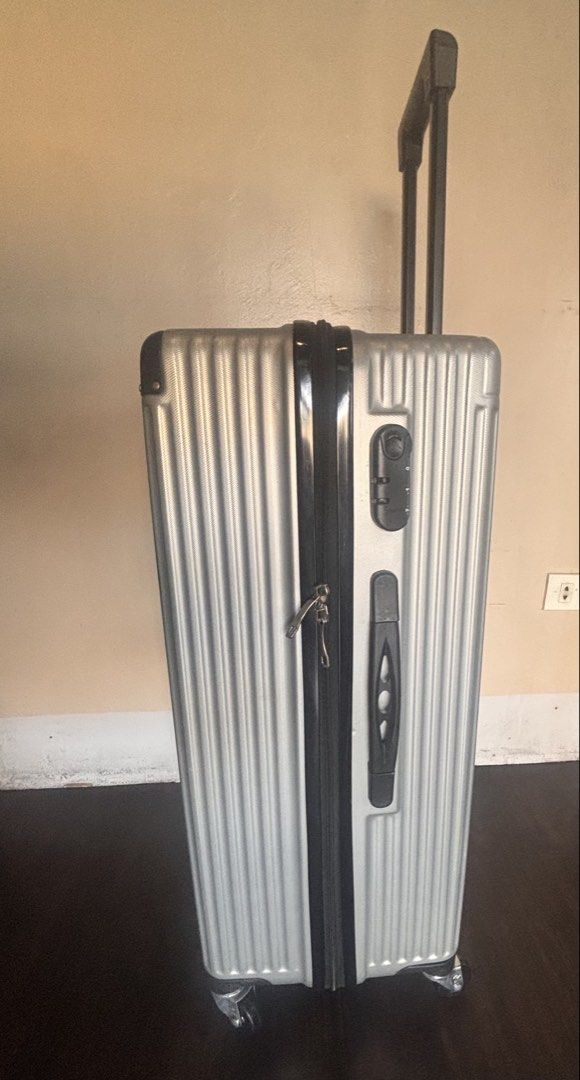 Silver Large Travel Luggage Trolley (Category: Luggage) located in Manila. Submitted by hotstuffmanila (Listing ID 1447862911, Image 2). Description: Silver Travel Luggage Trolley Large Luggage for Sale: This is the large-sized luggage from a 3-piece luggage set (small medium and large). Price: For the large luggage only. I’m also selling it together with the medium luggage for ₱3,000. The small luggage (cabin size) has a broken handle, but I’ll 