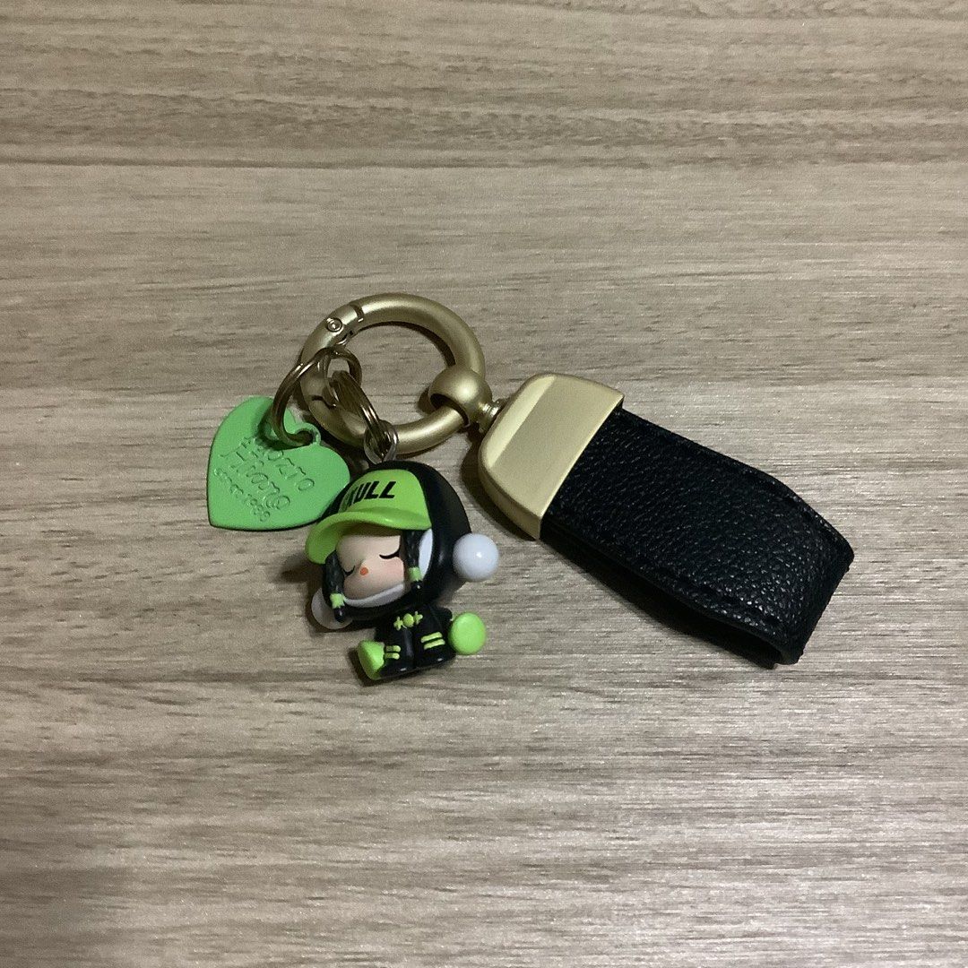 Skull Panda Pop Mart with leather keychain strap (DIY) (Category: Designer & Blind Box Toys) located in Manila. Submitted by pmpmprn (Listing ID 1447690977, Image 1). Description: Authentic Pop Mart Skull Panda pop bean with diy leather keychain.