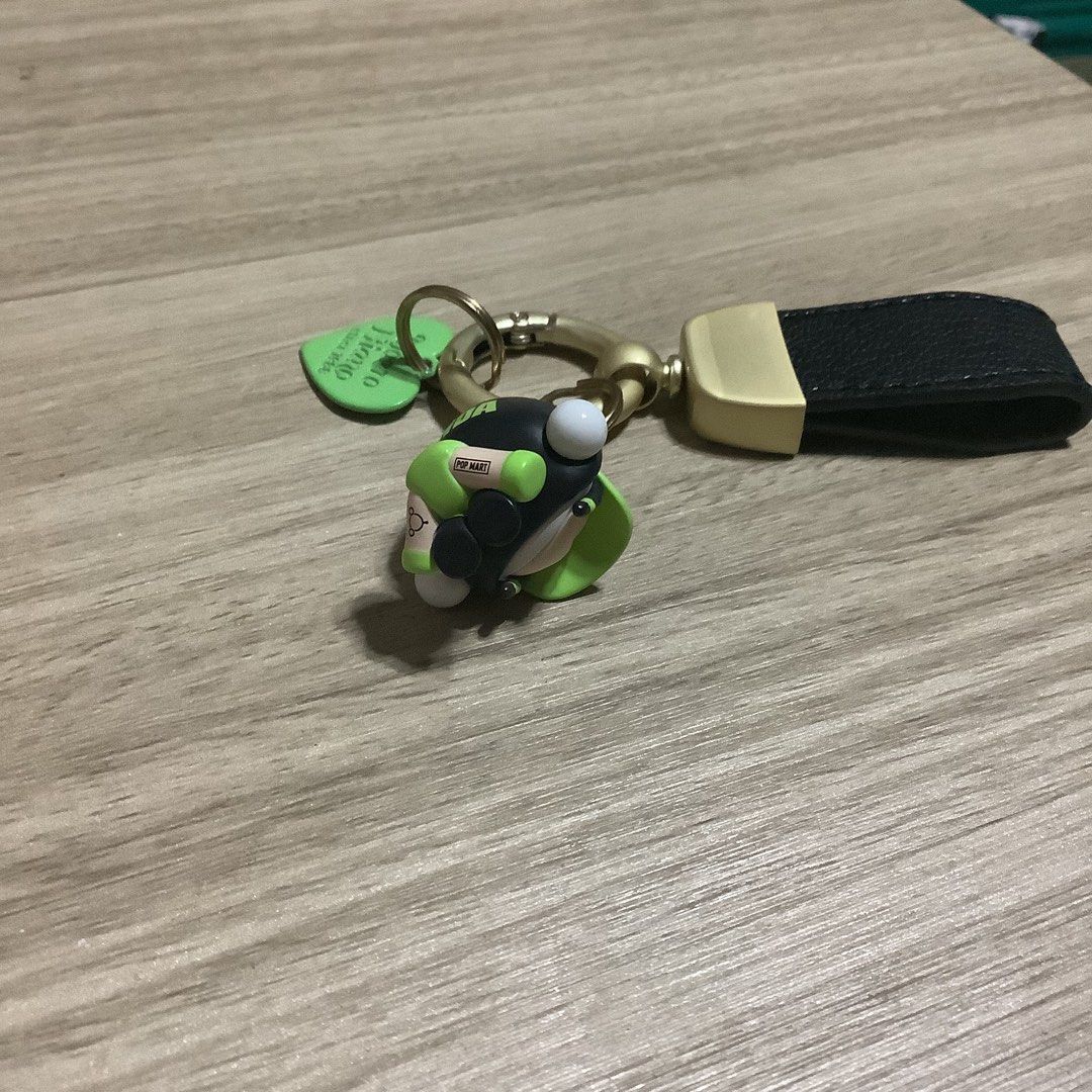 Skull Panda Pop Mart with leather keychain strap (DIY) (Category: Designer & Blind Box Toys) located in Manila. Submitted by pmpmprn (Listing ID 1447690977, Image 2). Description: Authentic Pop Mart Skull Panda pop bean with diy leather keychain.