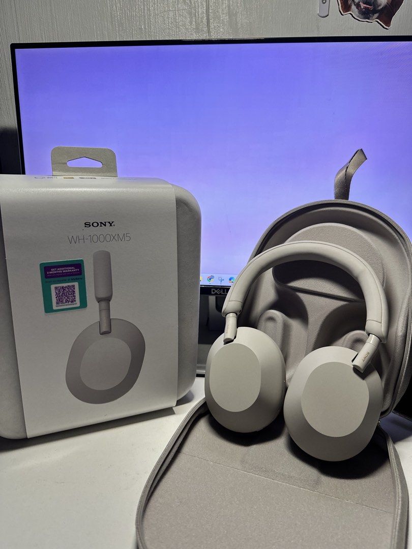 Sony XM-5 (Category: Headphones & Headsets) located in Quezon City. Submitted by alison.am (Listing ID 1447757572, Image 1). Description: Barely used. Bought this for my in-office meetings but barely used since im working 1-2x a week in office. At home using this only for audio. Also bought a wired working headset. Complete with box, case, original cord and receipt..
