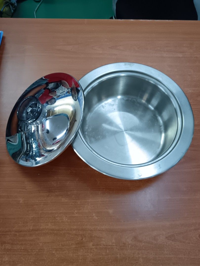 Stainless Steel Pot with Lid (Category: Cookware & Accessories) located in Kuala Lumpur. Submitted by george294 (Listing ID 1447774618, Image 2). Description: - Shiny stainless steel pot - Includes matching lid - Ideal size for everyday cooking - Clean and ready for immediate use - Durable and long-lasting material.
