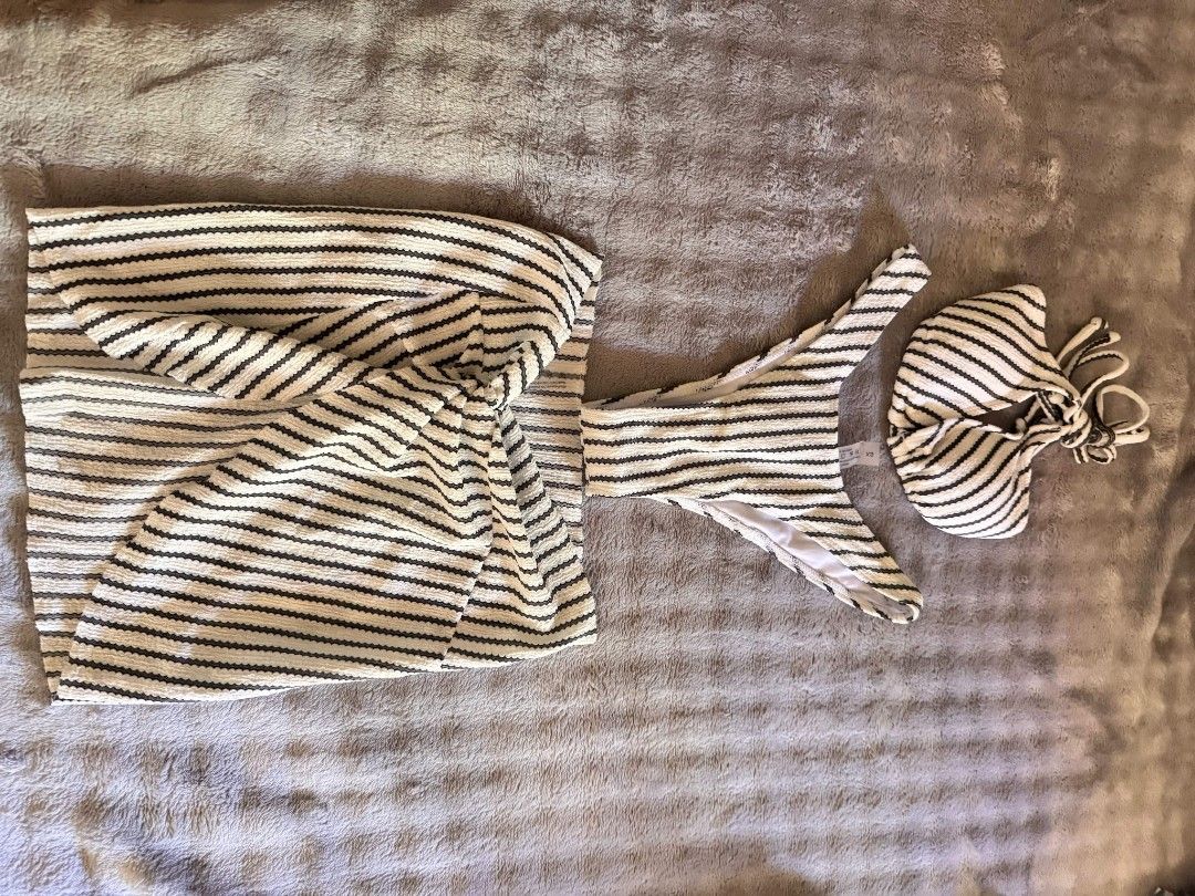 Swim Vcay 3-Piece Striped Bikini Set (Category: Bikinis & Swimsuits) located in Baliuag. Submitted by same1693 (Listing ID 1437698918, Image 3). Description: - Swim Vcay bikini set - Black and white striped pattern - Includes: halter top, wrap skirt, and headscarf - Comfortable material - Ideal for beach or poolside.