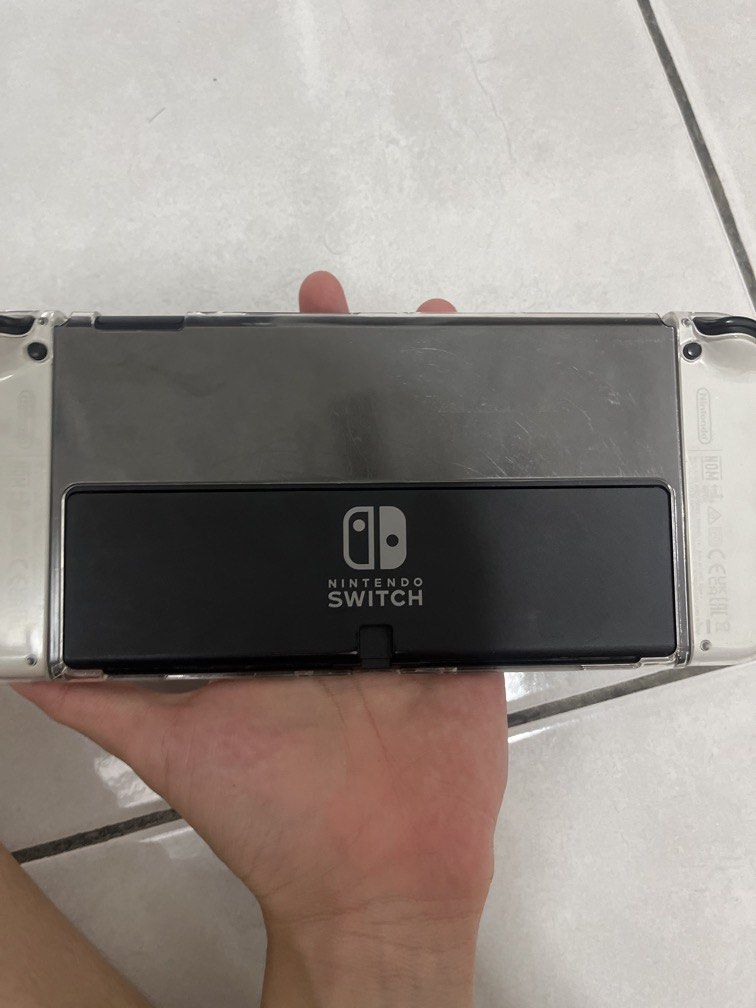 Switch oled (Category: Nintendo) located in Kuala Lumpur. Submitted by rafael_1011 (Listing ID 1447723892, Image 3). Description: Only come with console and mig switch 128 gb.