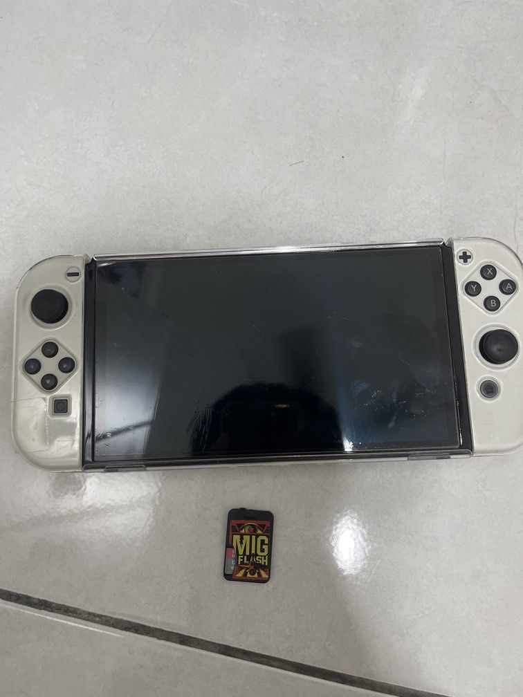 Switch oled (Category: Nintendo) located in Kuala Lumpur. Submitted by rafael_1011 (Listing ID 1447723892, Image 1). Description: Only come with console and mig switch 128 gb.