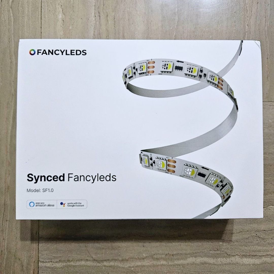 Synced FancyLEDS (Category: Lighting) located in Singapore. Submitted by d00nster (Listing ID 1447773821, Image 3). Description: BNIB. Brand: Fancyleds Product name: Synced Fancyleds Length: 5 meters LED type: 96 RGBW LEDs per meter Description: TV sync LEDs. Enhance your lighting setup with Synced Fancyleds! These versatile LEDs wirelessly sync with your Fancy Sync Box, allowing you to place and orient them anywhere in your room through the app—
