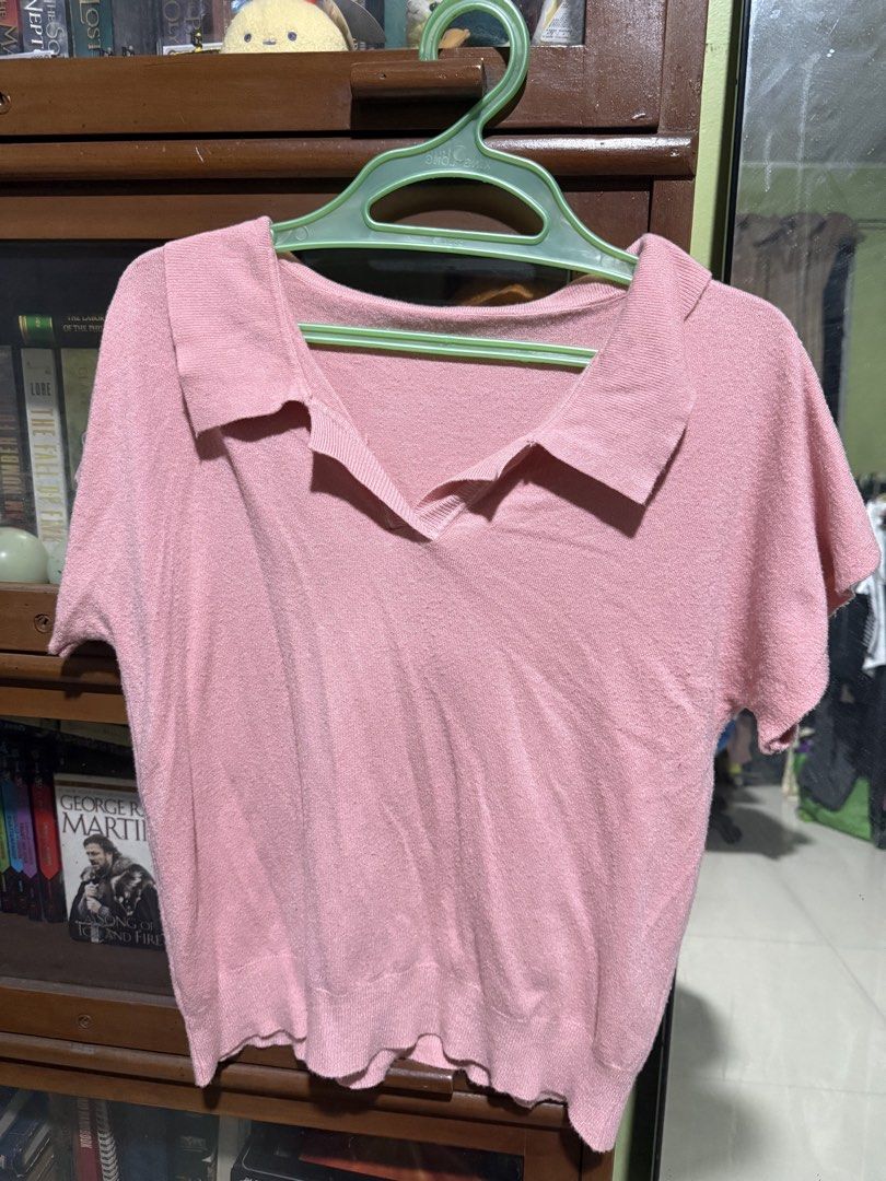 Thailand Pink Collared Short Sleeve Knit Top (Large) (Category: Blouses) located in Quezon City. Submitted by halpharagus (Listing ID 1447814539, Image 1). Description: - Cute pink knit top - Features a collar - Short sleeves - Cropped length - Comfortable and casual - Versatile for everyday wear - Pairs well with jeans or skirts - No size tag but fits M-L.