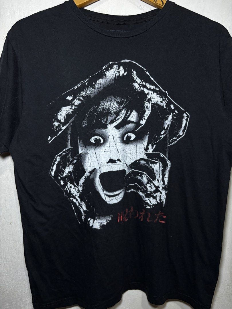 The Grudge Horror tee (Category: Tshirts & Polo Shirts ) located in Calamba. Submitted by sinauna. (Listing ID 1447812408, Image 3). Description: WTS: The Grudge Horror tee Condition/Issues: needs wash (Note: Item’s not faded. Color may vary due to lighting) Dimension: 20.5x27 Size on tag: Medium Price: Mine - 499+SF Plus shipping fee! Free shipping if you purchase more than 3 items. Also, can give you a discount in my previous listings so check 