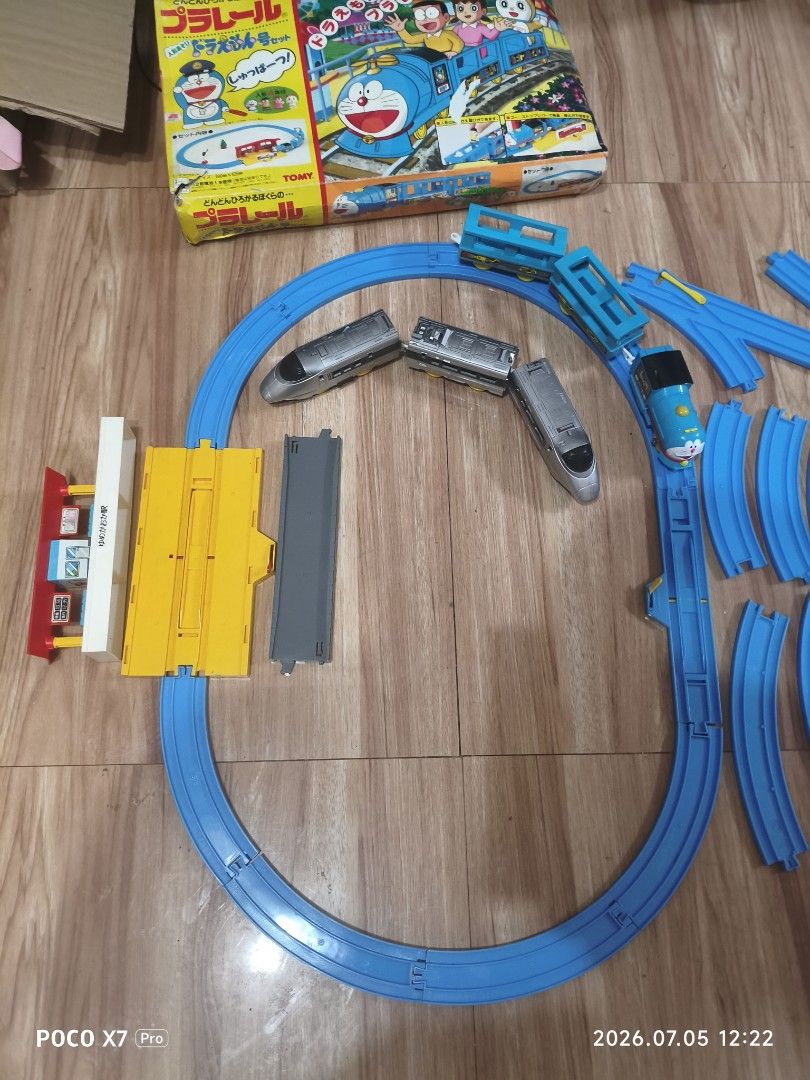 Tomica Plarail Doraemon Train Set (Category: Vehicle & Diecast Models) located in Baguio. Submitted by baguiobeans (Listing ID 1447710486, Image 2). Description: WYSIWYG - Fun Tomica Plarail train set featuring Doraemon. - Includes various train cars and track pieces. - Comes with a station building. - Ideal for Doraemon and train enthusiasts. - Lets you build your own railway adventure!.