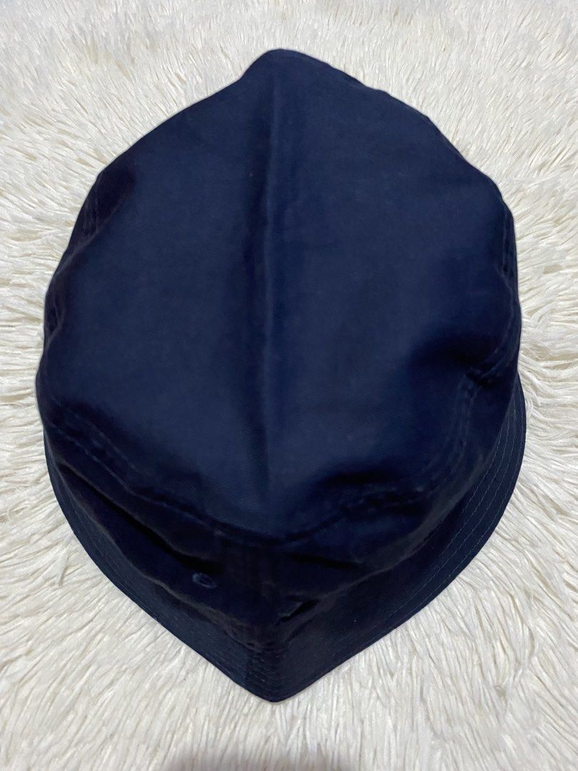 Tommy Hilfiger Navy Blue Bucket Hat OS (Category: Caps & Hats) located in Bulacan. Submitted by rich2545 (Listing ID 1447787922, Image 1). Description: - Navy blue Tommy Hilfiger bucket hat - Size: OS (One Size Fits Most) - Classic and simple design - Ideal for sunny days - Easy to pack and travel-friendly - Perfect for completing casual outfits.