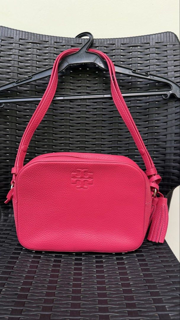 Tory Burch crossbody and shoulder bag (Category: Luxury Bags & Wallets) located in Manila. Submitted by hola.koala (Listing ID 1447750251, Image 3). Description: Two way bag - crossbody and shoulder bag Color - bright azalea Leather Interior Zip and slip pocket Adjustable shoulder strap Authentic 9.5°L x 7.0* H x 2.8”W.