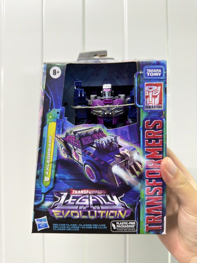 Transformers Legacy Evolution Axlegrease (Category: Toy Figures) located in Singapore. Submitted by gillyboy (Listing ID 1446155104, Image 1). Description: - Transformers Legacy Evolution Deluxe Class Axlegrease figure - Features robot and vehicle alt mode - Perfect for Transformers collectors - Brand new and ready for your collection.