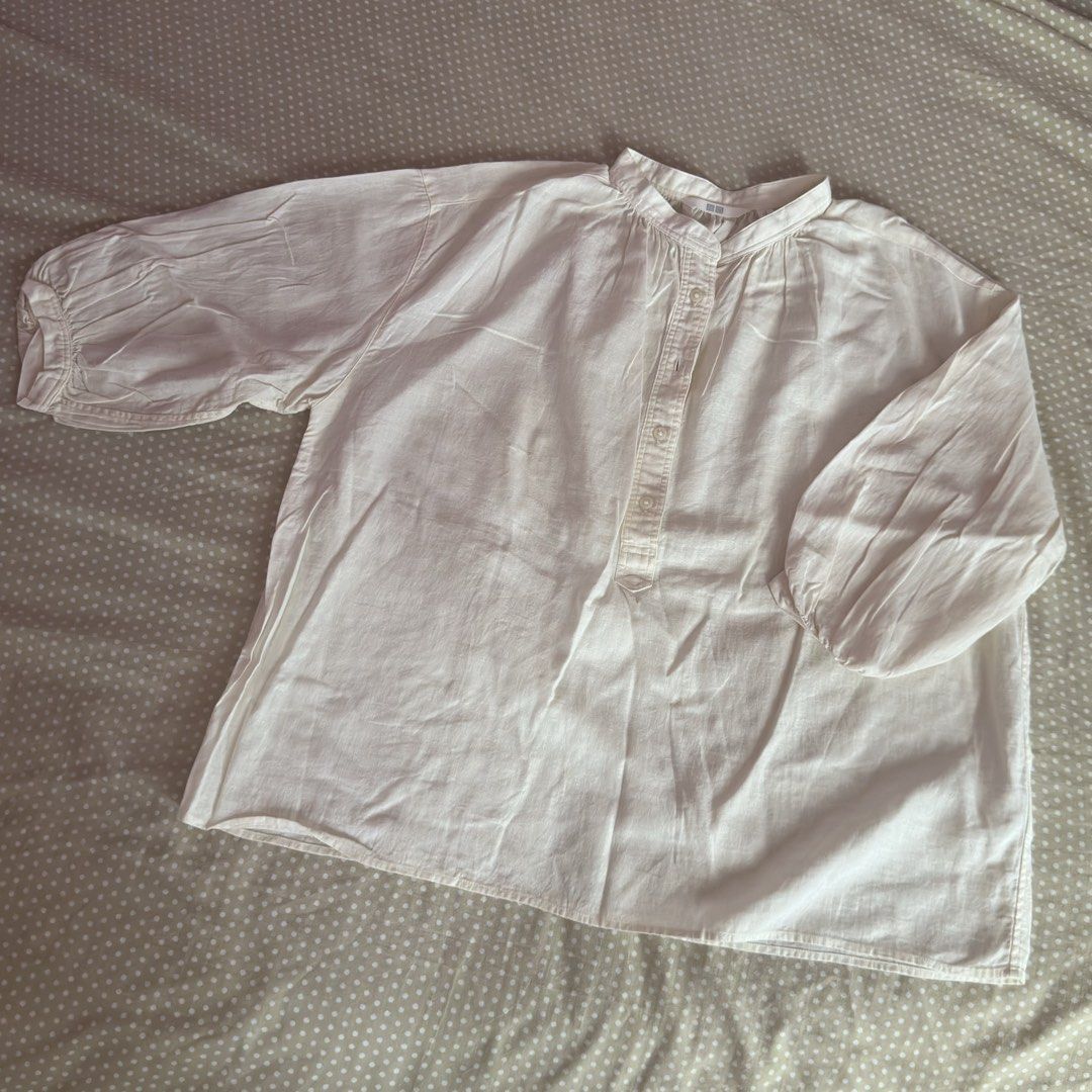 Uniqlo White Band Collar Blouse (Category: Blouses) located in Mandaue City. Submitted by aintnicoles (Listing ID 1447760732, Image 1). Description: - used only once for an event ⭐️ - buyer must shoulder the sf - leyte, ph - msg for more info!.