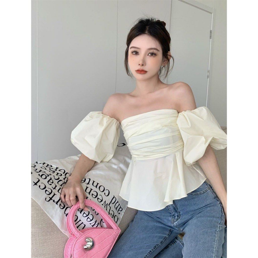 Vietnamese Fabric Off-Shoulder Puff Sleeve Blouse (Category: Blouses) located in Quezon City. Submitted by ree_.declutters (Listing ID 1447760131, Image 3). Description: Bought from a Vietnamese shop Very elegant and feminine! Color: Beige/Off-white SIZE: S-M .
