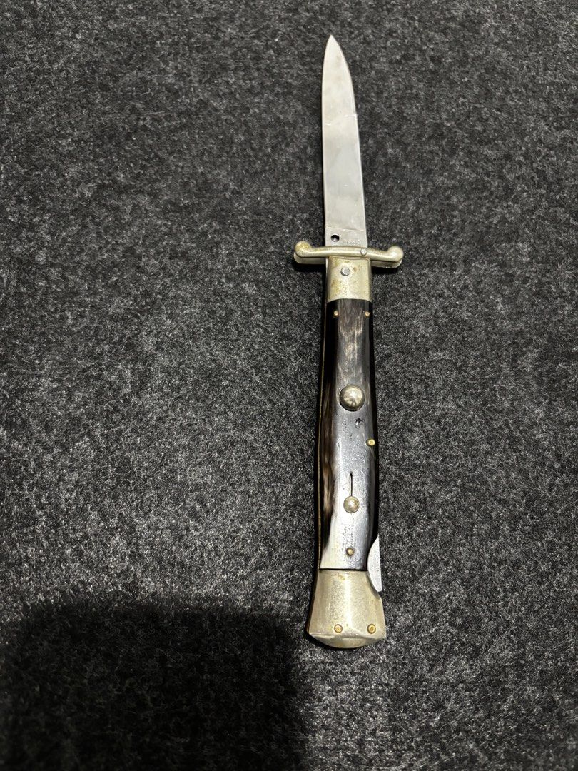 Vintage Italy Stilleto (Category: Vintage Collectibles) located in Bacoor. Submitted by round2pinas (Listing ID 1447874257, Image 1). Description: - Vintage Italian Stiletto knife - Authentic Italian craftsmanship - Unique dark horn handle with detailed accents - Sharp, classic blade design - A must-have for any vintage knife collector.