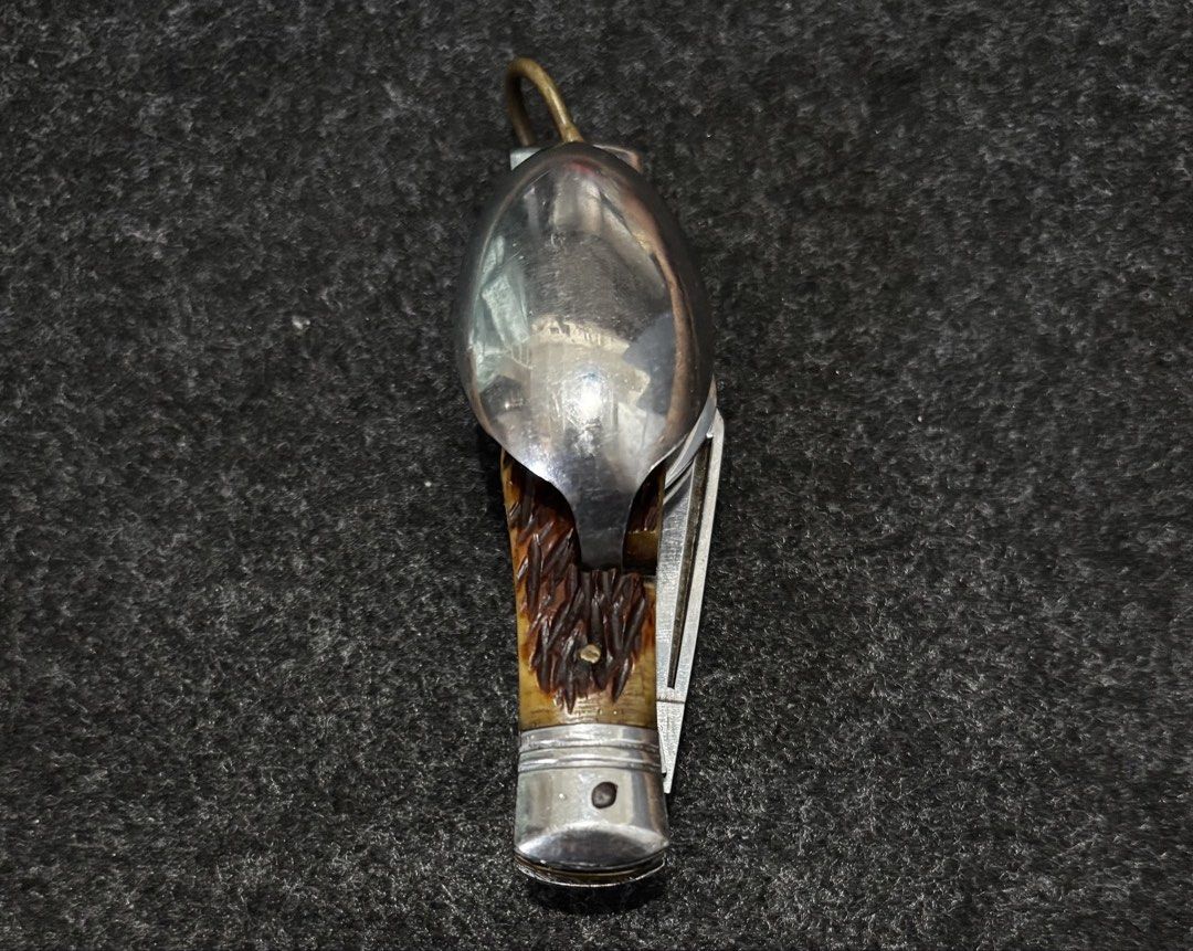 Vintage Multi-tool Spoon Knife Fork Bottle Opener (Category: Vintage Collectibles) located in Bacoor. Submitted by round2pinas (Listing ID 1447873786, Image 1). Description: - Vintage multi-tool - Includes spoon, knife, fork, and bottle opener - Handles appear to be bone or horn - Ideal for camping or collecting - Shows wear consistent with age and use - Fully functional.
