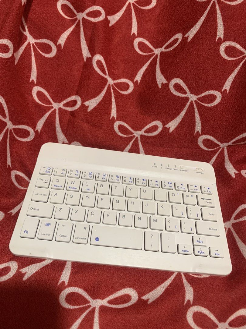 White Wireless Bluetooth Keyboard (Category: Computer Keyboard) located in Manila. Submitted by elaitems (Listing ID 1447799086, Image 1). Description: - White wireless keyboard - Connects via Bluetooth - Ideal for tablets or ipad - comes with a charger.