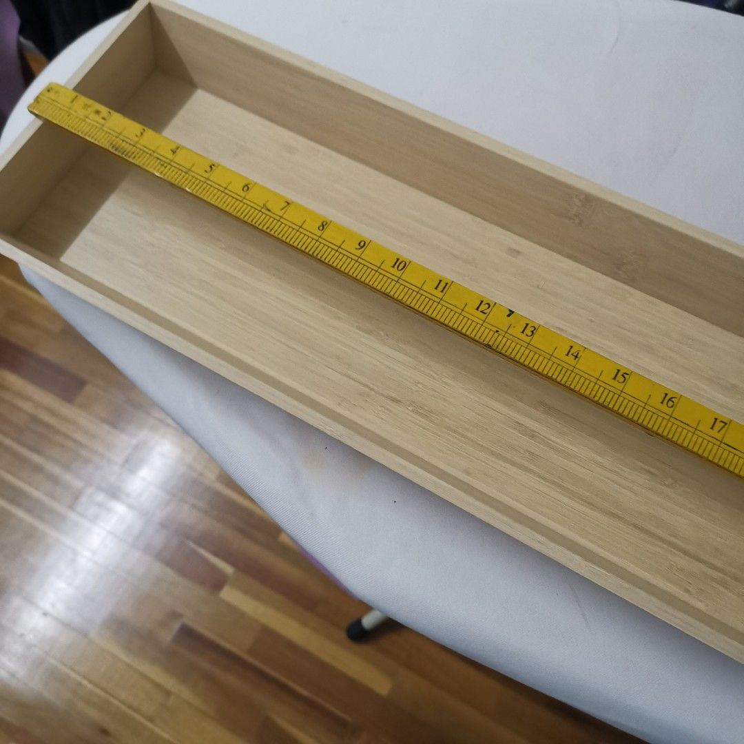 Wooden Tray Organizer (Category: Other Kitchenware & Tableware) located in Kuala Lumpur. Submitted by kavithanambaraja (Listing ID 1447851251, Image 1). Description: - Simple wooden tray, ideal for organizing small items. - Made of light-colored wood (possibly bamboo). - Rectangular shape with low sides. - Measures approximately 17 inches in length. - Versatile use for crafts, stationery, or small accessories. New. I have 2 each for RM50 .