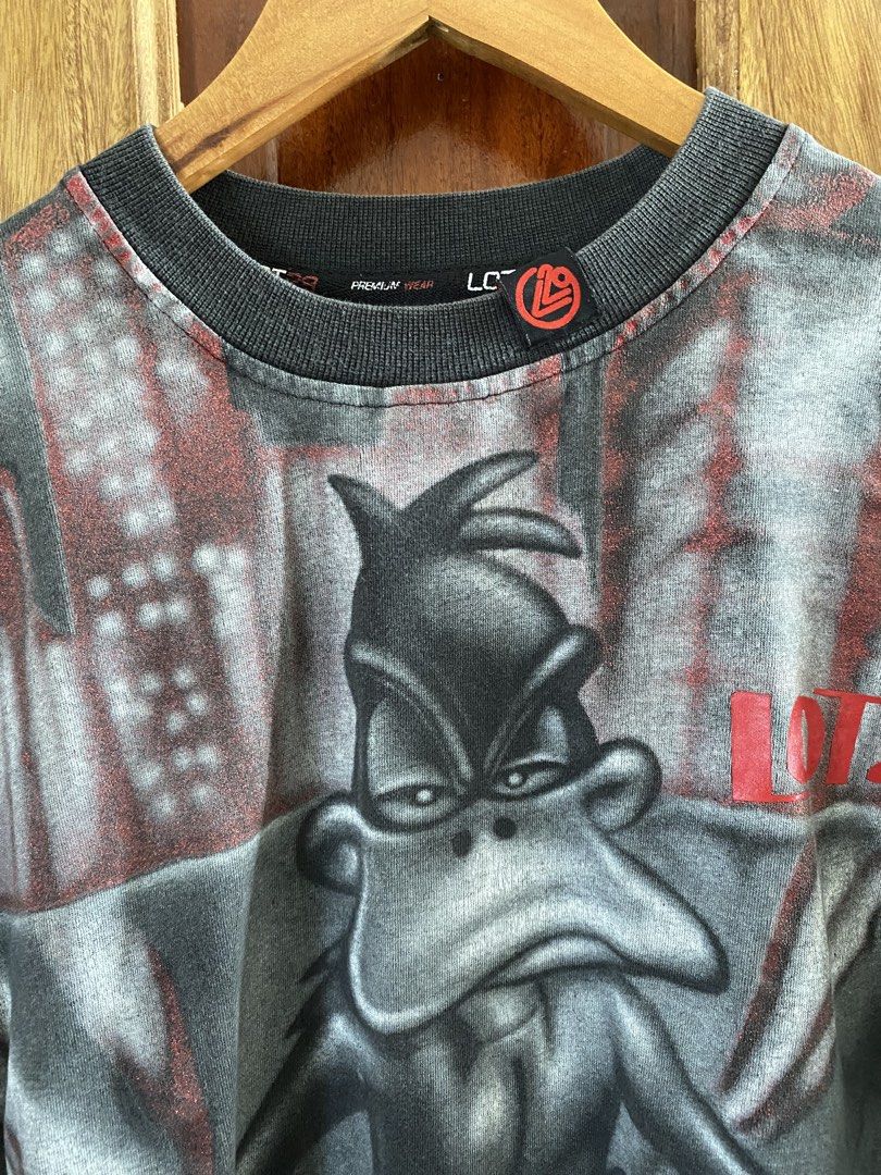 Y2K LOT29 Daffy Duck Shirt (Category: Tshirts & Polo Shirts ) located in Dumaguete. Submitted by infiniteloot_ (Listing ID 1447786185, Image 2). Description: Rare Y2K LOT29 Daffy Duck Shirt Size L on tag fits XL 29 length x 24 width good condition no flaws iykyk DM 🪖.