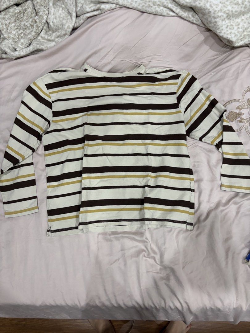 ZARA Striped Long-Sleeved Shirt (Category: Longsleeves) located in Manila. Submitted by hoochie (Listing ID 1447816692, Image 1). Description: - Size: XL/XXL - RFS: Too big for me - Rarely worn - Classic long-sleeved shirt - Features horizontal stripes in white, dark brown, and mustard yellow - Comfortable and versatile for casual wear - Easily pairs with jeans or shorts - Ideal for layering.