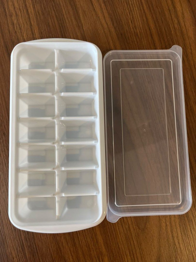 16 Cube Ice Cube Tray with Lid (Category: Other Kitchenware & Tableware) located in Kuala Lumpur. Submitted by newwolf-04de (Listing ID 1447974574, Image 1). Description: Title: DAISO Ice Cube Tray with Lid (Makes 14 Ice Cubes) Description Brand: DAISO Features: Comes with a convenient plastic lid to prevent spilling and freezer odours. Stackable design to save freezer space. Capacity: Makes 14 ice cubes at one time. Condition: Used, but thorough