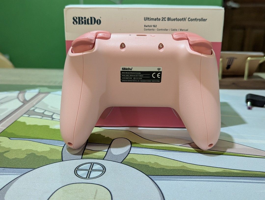 8BitDo Ultimate 2C Bluetooth Controller Pink (Category: Controllers) located in Iriga City. Submitted by seigcor (Listing ID 1447931463, Image 3). Description: - Pink 8BitDo Ultimate 2C Bluetooth Controller - Compatible with Nintendo Switch and other devices - Includes: Controller, USB-C cable, manual - Original packaging intact - Tested and confirmed working - Perfect for gaming anywhere.