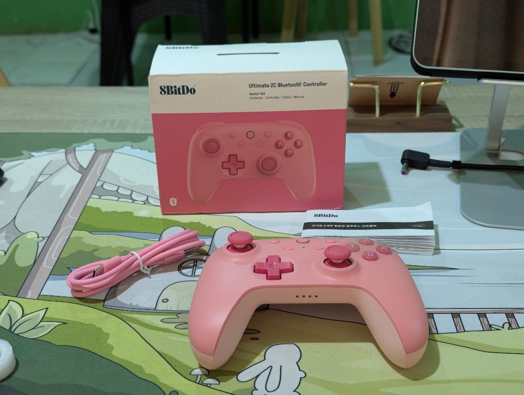 8BitDo Ultimate 2C Bluetooth Controller Pink (Category: Controllers) located in Iriga City. Submitted by seigcor (Listing ID 1447931463, Image 1). Description: - Pink 8BitDo Ultimate 2C Bluetooth Controller - Compatible with Nintendo Switch and other devices - Includes: Controller, USB-C cable, manual - Original packaging intact - Tested and confirmed working - Perfect for gaming anywhere.