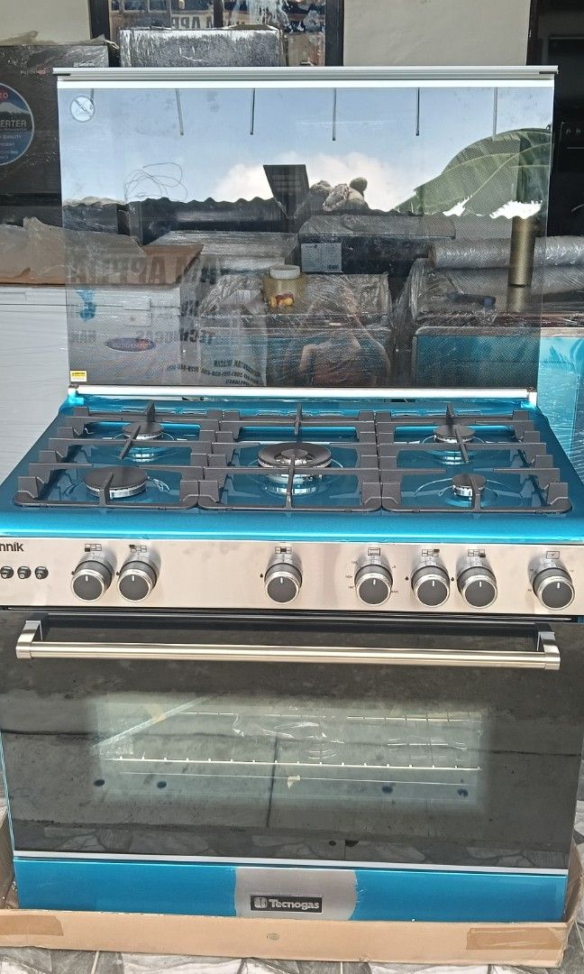 90cm Gas Range Tecnogas with Full Oven (Category: Cookers) located in Caloocan City. Submitted by yam_appliances (Listing ID 1447990140, Image 2). Description: 90 cm Cooking Range 5 Gas Burners with Wok Burner Cast Iron Pan Support Sabaf / Defendi Burners Full Electric Ignition Minute Minder Full Stainless Steel Oven Features: Gas Oven / Gas Grill 3 Cooking Functions Thermostat Controlled Oven Oven Safety Valves Double Glass LOW-E Oven Door 130 L