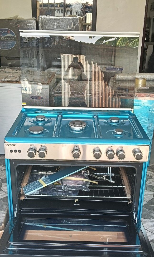 90cm Tecnogas Gas Range Big Oven (Category: Cookers) located in Caloocan City. Submitted by yam_appliances (Listing ID 1447991177, Image 2). Description: 90 cm Cooking Range 5 Gas Burners with Wok Burner Cast Iron Pan Support Sabaf / Defendi Burners Full Electric Ignition Minute Minder Full Stainless Steel Oven Features: Gas Oven / Gas Grill 3 Cooking Functions Thermostat Controlled Oven Oven Safety Valves Double Glass LOW-E Oven Door 130 L - Lar