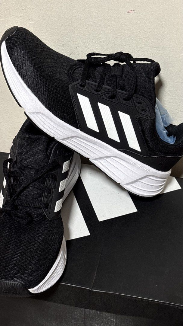 Adidas Galaxy 6M (Category: Sneakers) located in Quezon City. Submitted by etceterass (Listing ID 1447990640, Image 1). Description: - Adidas Galaxy 6M Running Shoes - Color: Black with White Stripes - Size: US 11 (UK 10.5) - Original Purchase Price: PHP 3,500.00 - Includes Original Box - Ideal for Running and Everyday Wear.