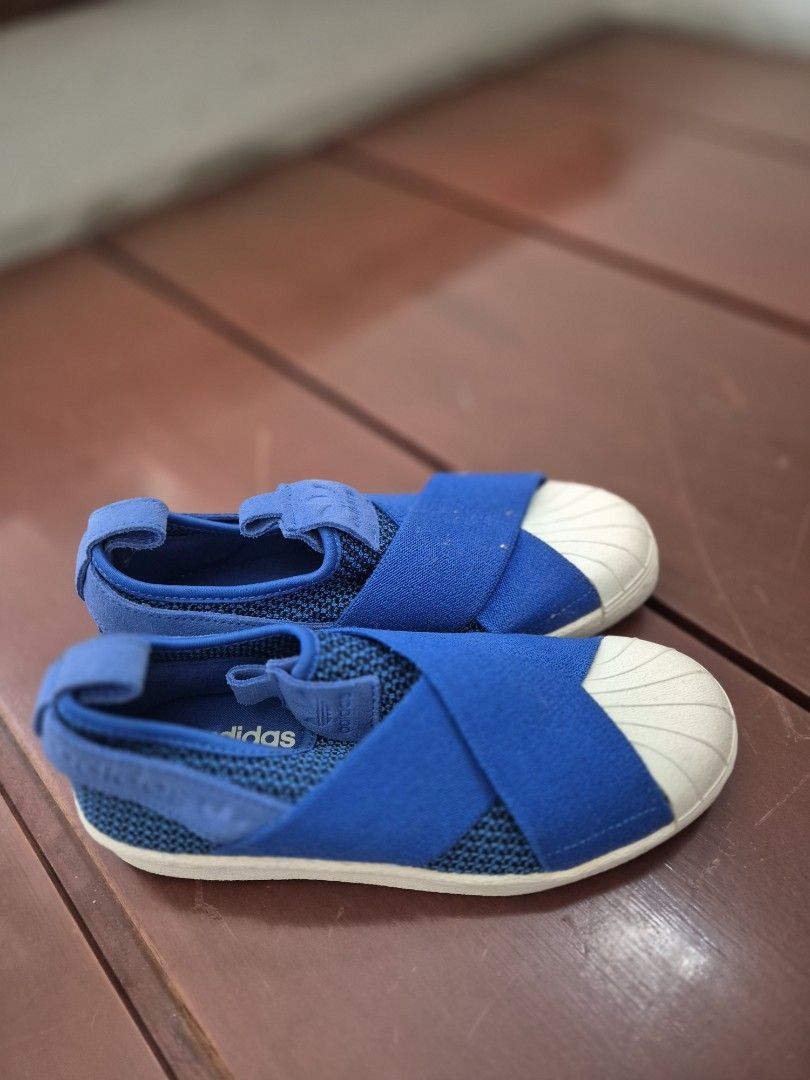 Adidas Slip On Shoes Blue (Category: Sneakers) located in San Jose. Submitted by nova2023 (Listing ID 1447892587, Image 2). Description: - Blue Adidas slip-on shoes - Breathable mesh material - Elastic straps for a secure fit - Classic white shell toe detail - Easy to slip on and off - Ideal for casual outings and everyday wear.