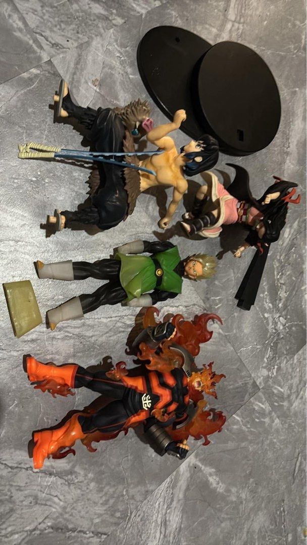 Anime Figures Lot (Category: Figurines & Statues) located in Manila. Submitted by millenial_cabinet (Listing ID 1447922653, Image 1). Description: - Bundle of anime figures - Features characters from MHA, Dragon Ball, and Demon Slayer & MHA - Ideal for any anime fan's collection.