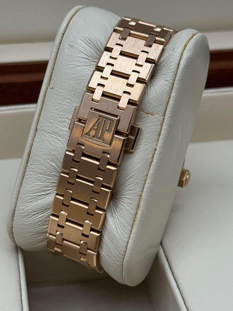 Audemars Piguet Rose Gold Automatic Watch (Category: Luxury Watches) located in Manila. Submitted by watchesbyjamesdy (Listing ID 1447929383, Image 3). Description: - Rose gold Audemars Piguet Royal Oak watch - Automatic movement - White dial with grid pattern - Date window at 3 o'clock - AP logo on clasp - Classic and elegant design.