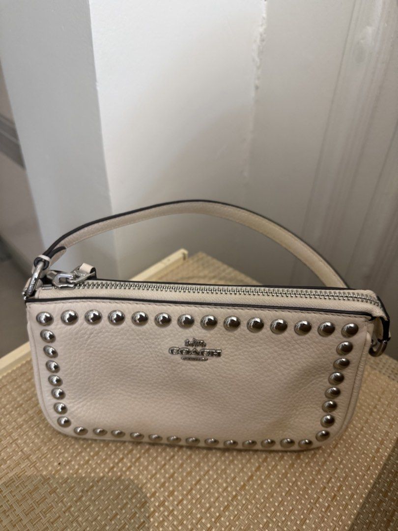 Authentic Coach Nolita 19 with Rivets (Category: Luxury Bags & Wallets) located in San Fernando. Submitted by girlirb (Listing ID 1445253644, Image 2). Description: - in White/Chalk - Brand New - needs cleaning.