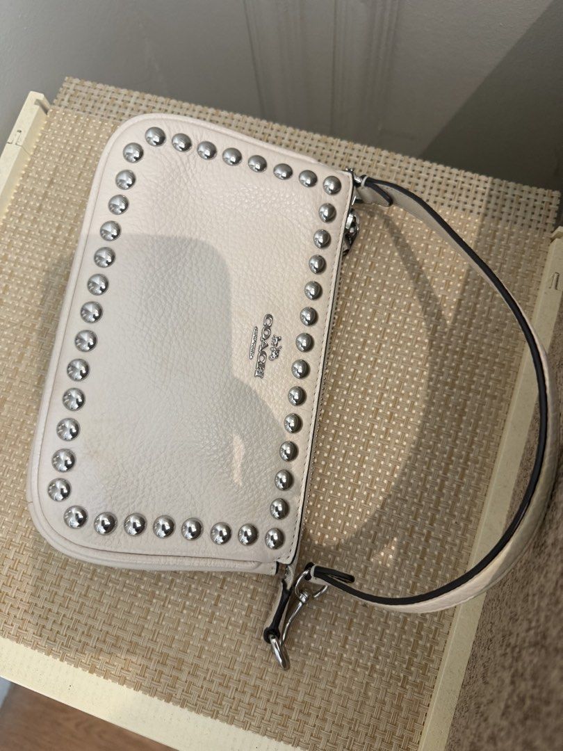 Authentic Coach Nolita 19 with Rivets (Category: Luxury Bags & Wallets) located in San Fernando. Submitted by girlirb (Listing ID 1445253644, Image 1). Description: - in White/Chalk - Brand New - needs cleaning.